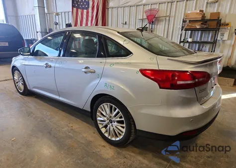 2017 Ford Focus Titanium from USA, damaged, VIN 1FADP3J27HL287867